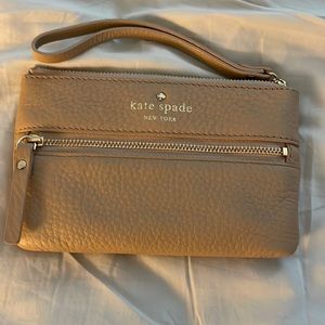 Kate Spade wallet/wristlet. Beige leather w/satin beige and white striped lining